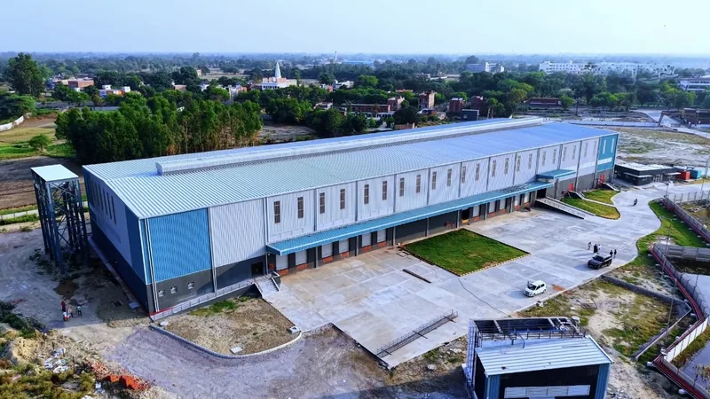 Factory with Office Block by Dhanshree Prefab Structure